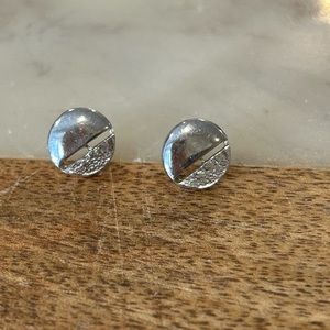 Simple silver studs with cutout and texture detail